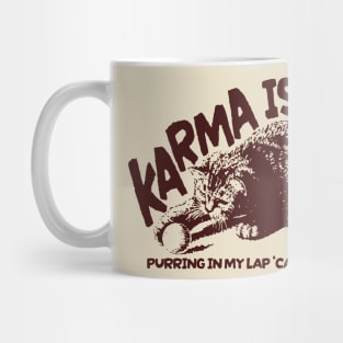 Karma is cat Vintage Mug